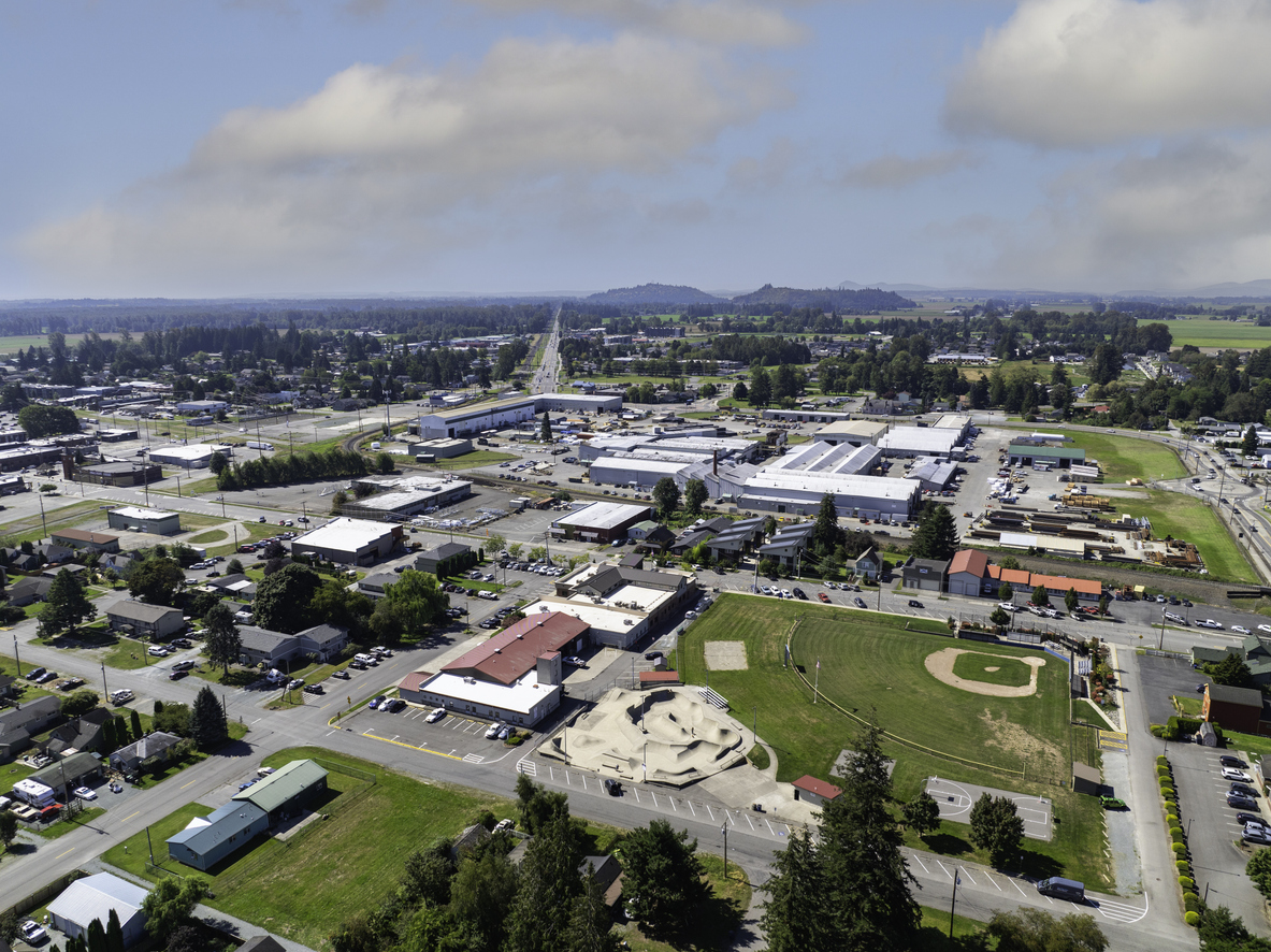 Aerial Landscape View of Sedro-Woolley, Washington on a Sunny Summer Day Licensed electrician performing residential electrical work in Sedro-Woolley, WA, including panel upgrades, wiring, lighting installation, and electrical repairs by Johnson Electrical Services.